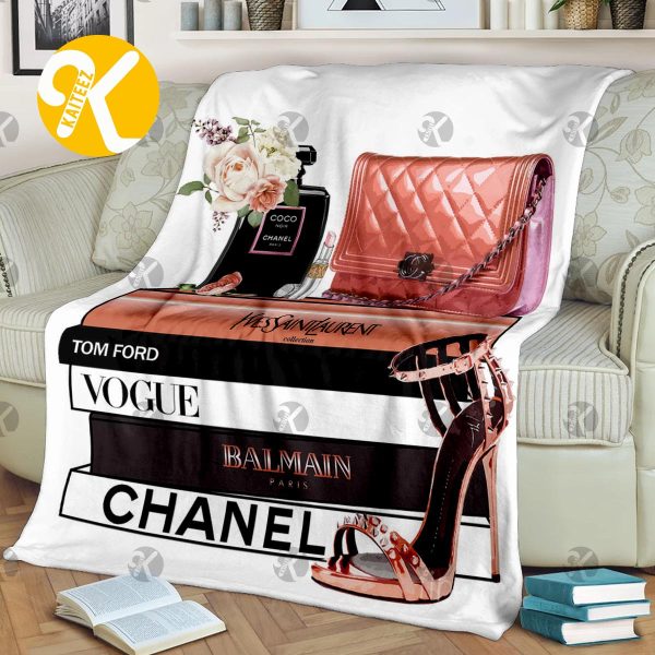 Chanel All Fashion Book Stack With Perfume And Purse In White Background Blanket