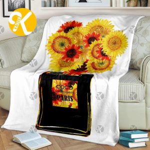 Chanel No.5 In Black Perfume Bottle With Sunflowers In White Background Blanket
