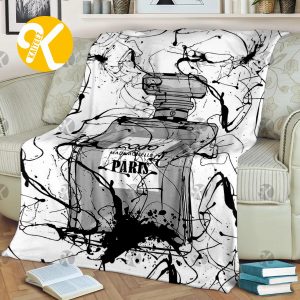 Chanel No.5 Perfume Bottle With Black Ink Splashes Effect In White Background Blanket